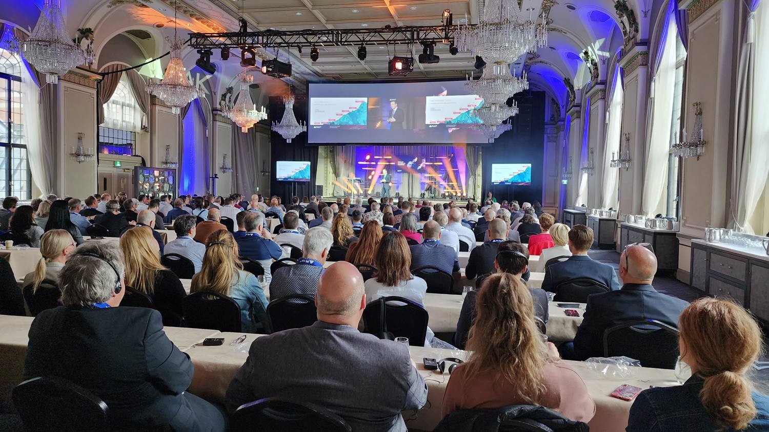 Live conference audience with simultaneous interpretation headsets